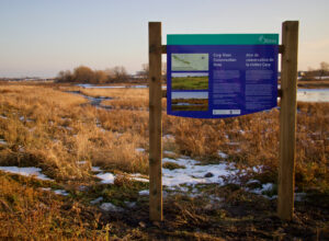Carp River Conservation Area welcome sign.